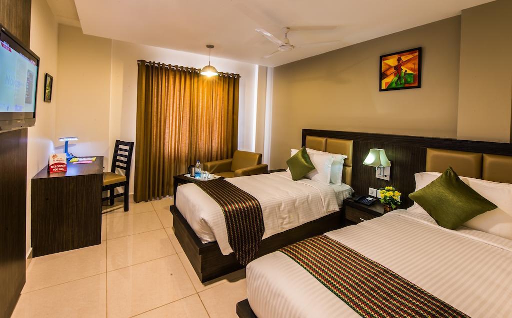 Plaza Hotel Trichy Tiruchirappalli Pokoj fotografie