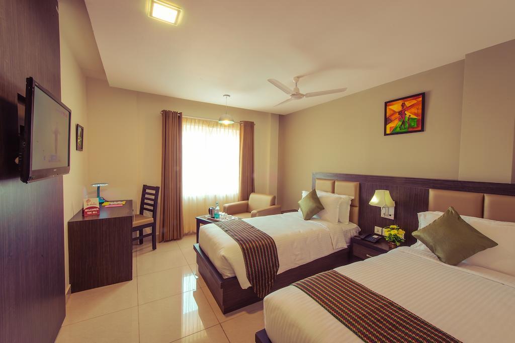 Plaza Hotel Trichy Tiruchirappalli Pokoj fotografie